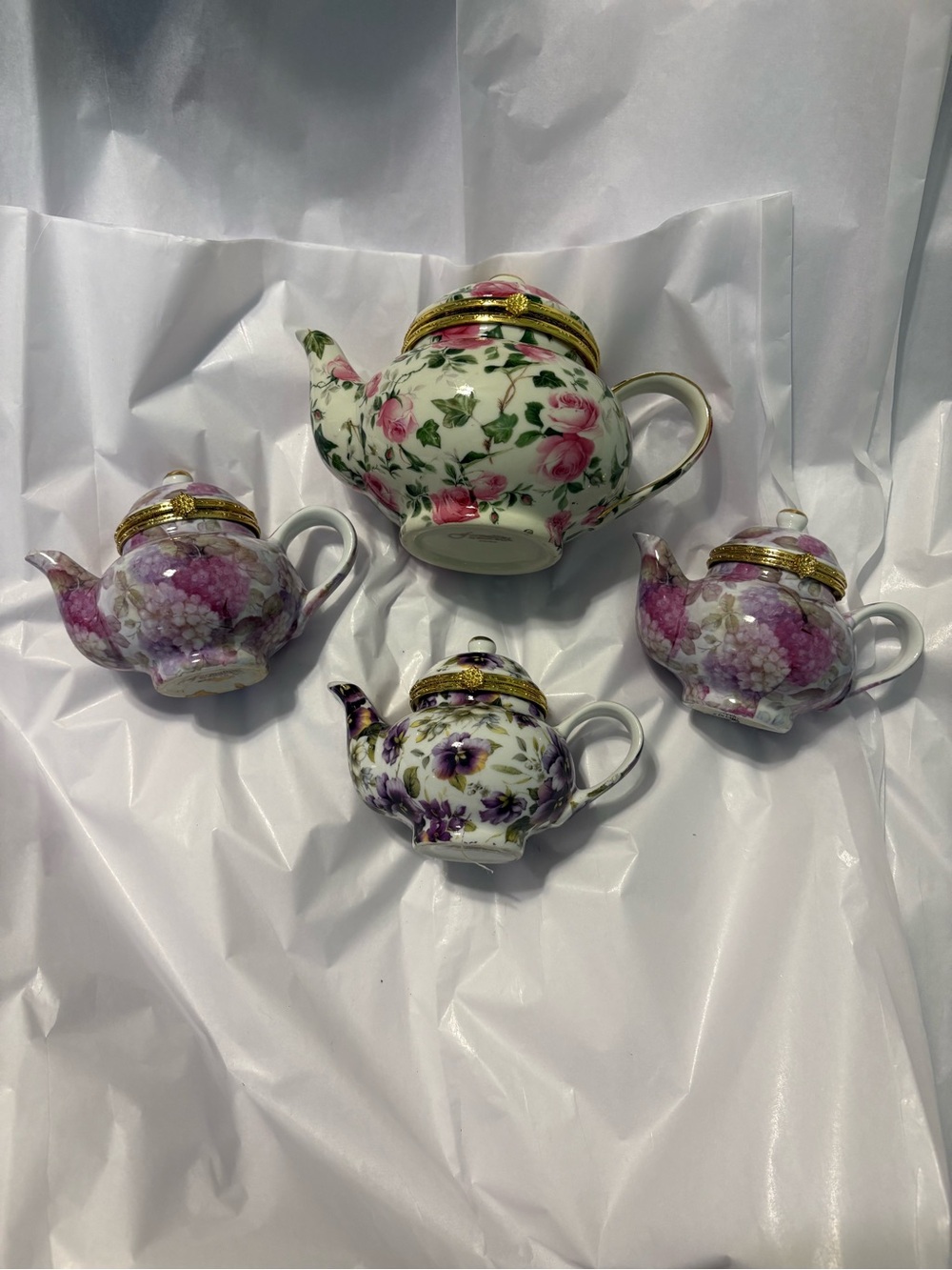 Baum Bros. Set of four teapots